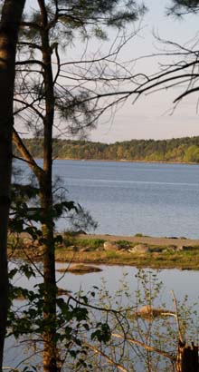 View to access road with water on both sides (photo by Webmaster)