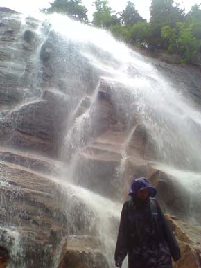 Standing in the spray of Arethusa Falls (photo by Bill Mahony)