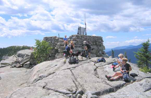 Group at fire tower remains on Middle Sister (photo by Mark Malnati)