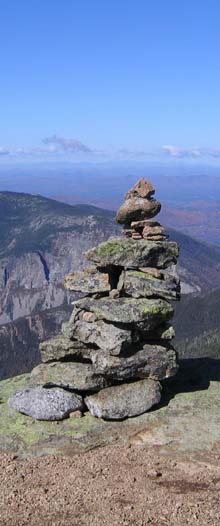 Leaning cairn with the cliffs of Cannon Mountain in the background (photo by Mark Malnati)