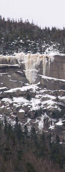 Icicles on East Osceola ledges as seen from lower Greeley Pond (photo by Webmaster)