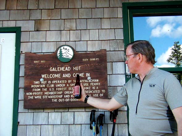 Jim enjoying a well-deserved beer at Galehead Hut (photo by James Horner)