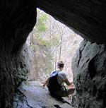 Faye exiting cave