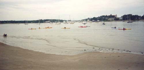Kayaks and boats on the ocean (photo by Webmaster)