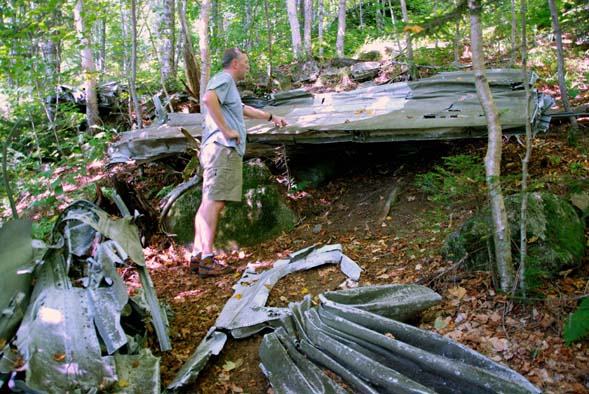 My son Doug looking at the wing (photo by Burt Hemp)