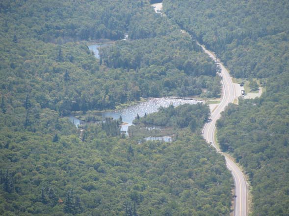 View of Willey Pond and Saco River opposite the Crawford Notch State Park Visitor Center (Willey House Historical Site) (photo by Karl Searl)