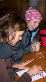 Diane and Rachel playing Scrabble at the hut (photo by Deb Hann)